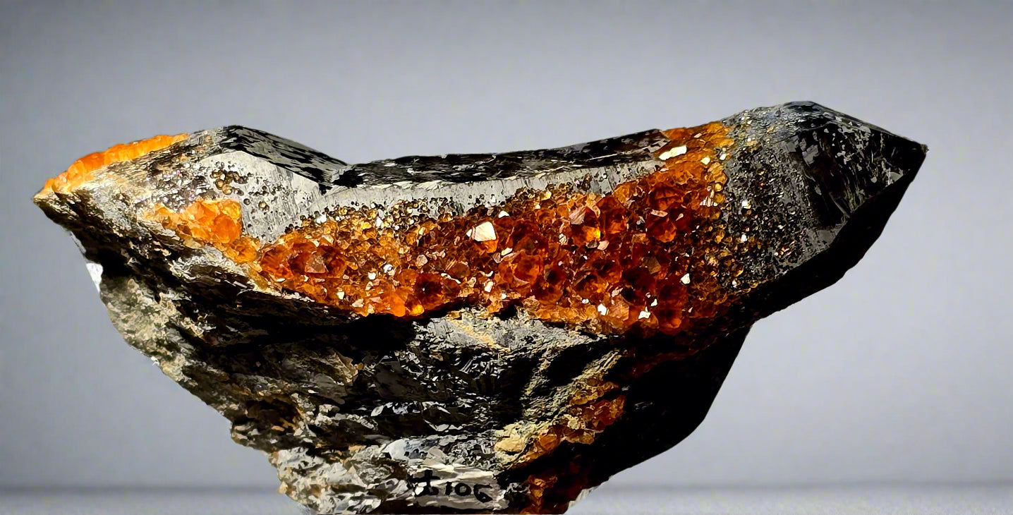 SPESSARTINE on SMOKEY QUARTZ, SERPENTINE GARNETS (small cabinet)