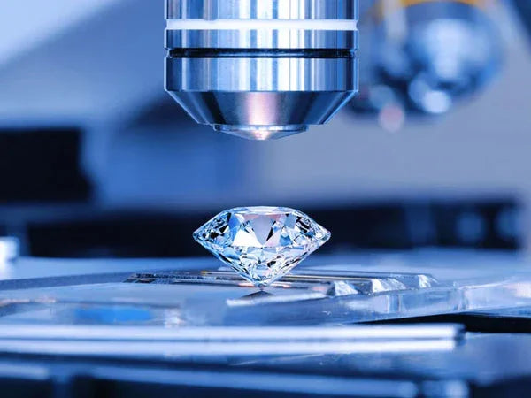Faceted diamond under microscope lens, lab setting, gemstone analysis