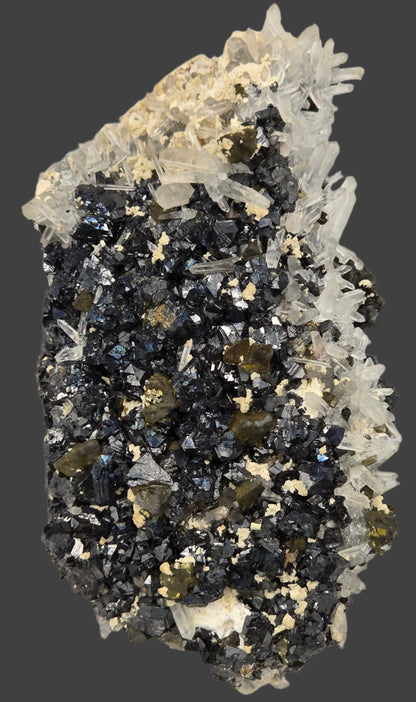 CHALCOPYRITE, PYRITE, MANGANO CALCITE, SPHALERITE with QUARTZ