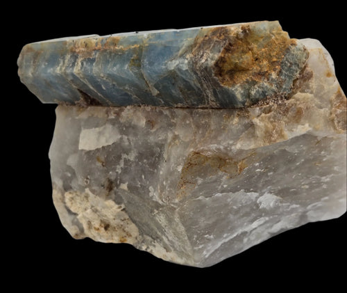 Blue calcite crystal specimen with layered formation and earthy matrix, mineral collector display piece