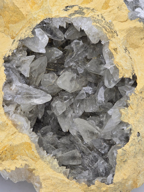 Smoky quartz crystal cluster in yellow matrix, mineral specimen for collectors