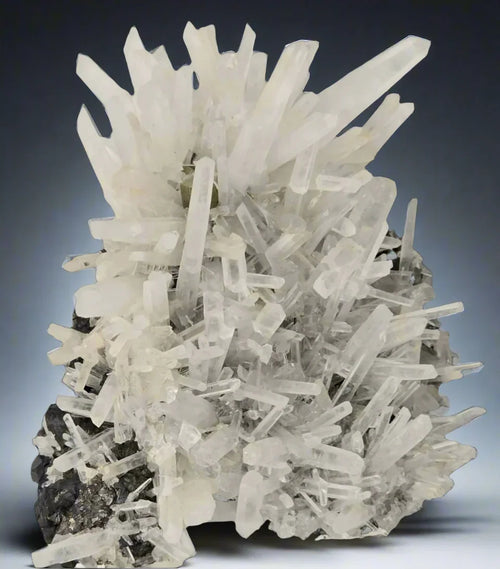Quartz crystal cluster from classic locality, clear prismatic specimens on dark matrix