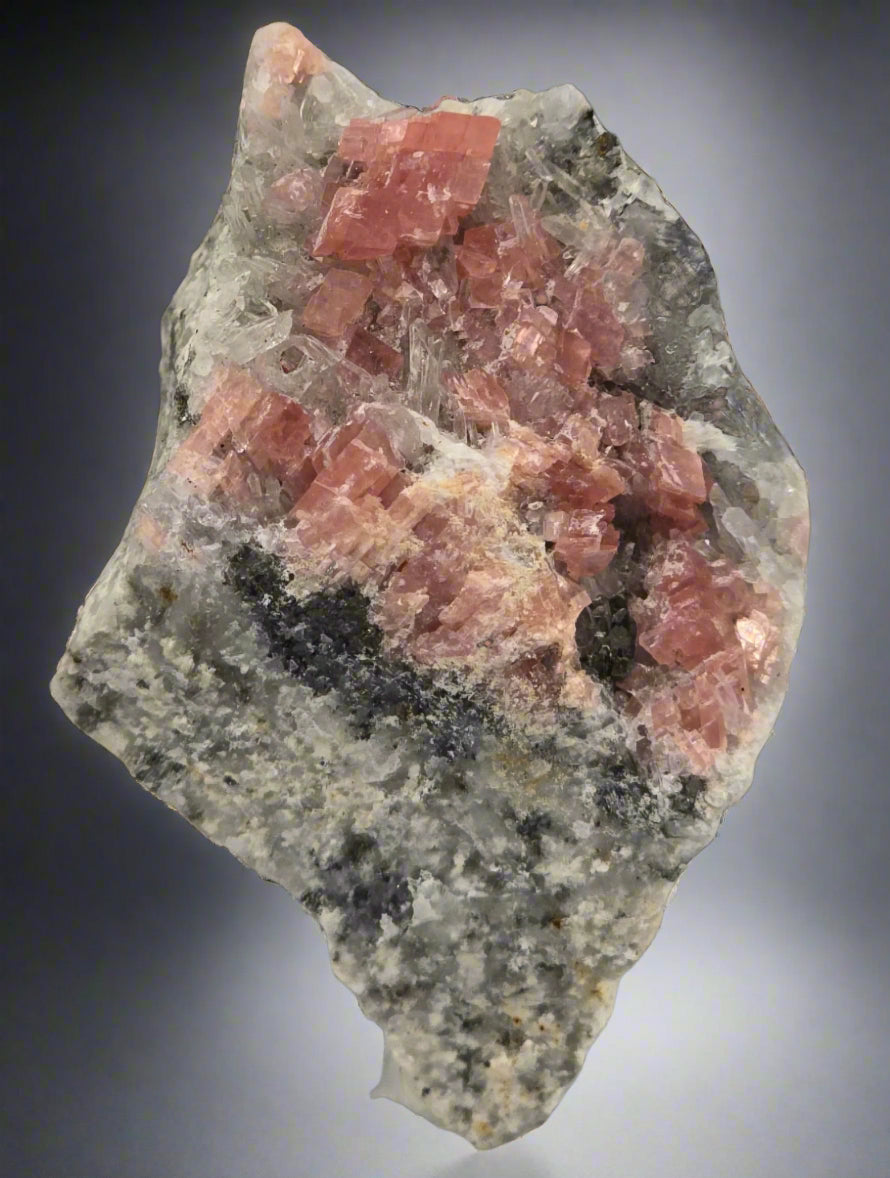 RHODOCHROSITE, QUARTZ and SPHALERITE (orange in LW UV) (small cabinet)