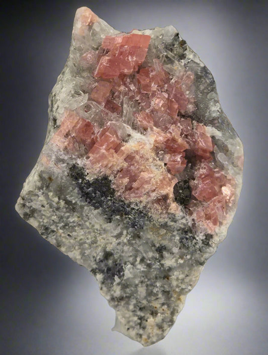 RHODOCHROSITE, QUARTZ and SPHALERITE (orange in LW UV) (small cabinet)