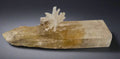 Calcite on Barite from Elmwood Mine, Tennessee - mineral specimen with clear crystals atop golden matrix