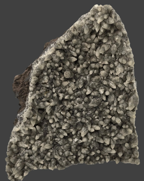 Heulandite mineral specimen with dense crystal clusters, natural geological formation