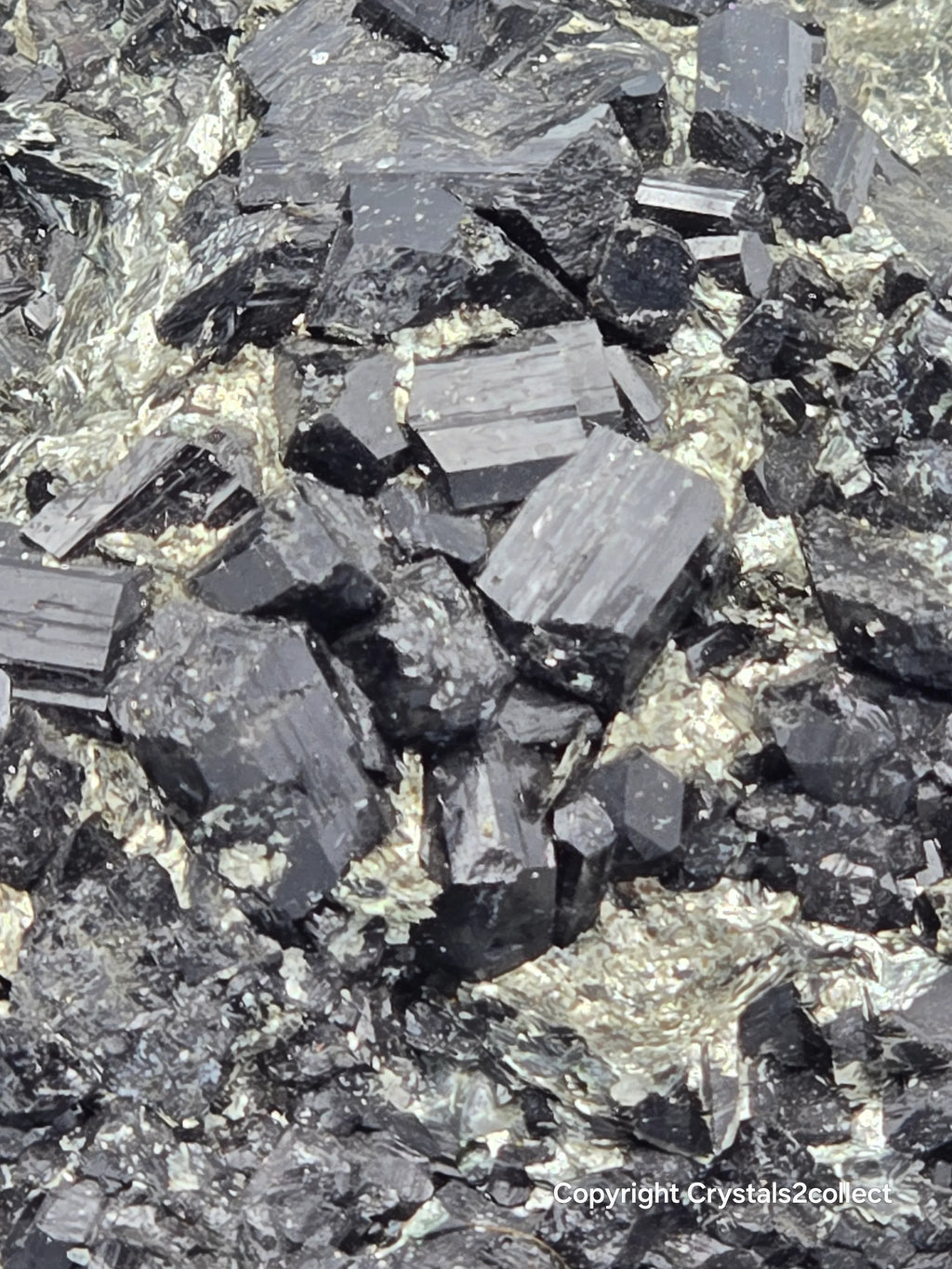 Hematite crystals with metallic luster, showcasing natural mineral specimens for collectors