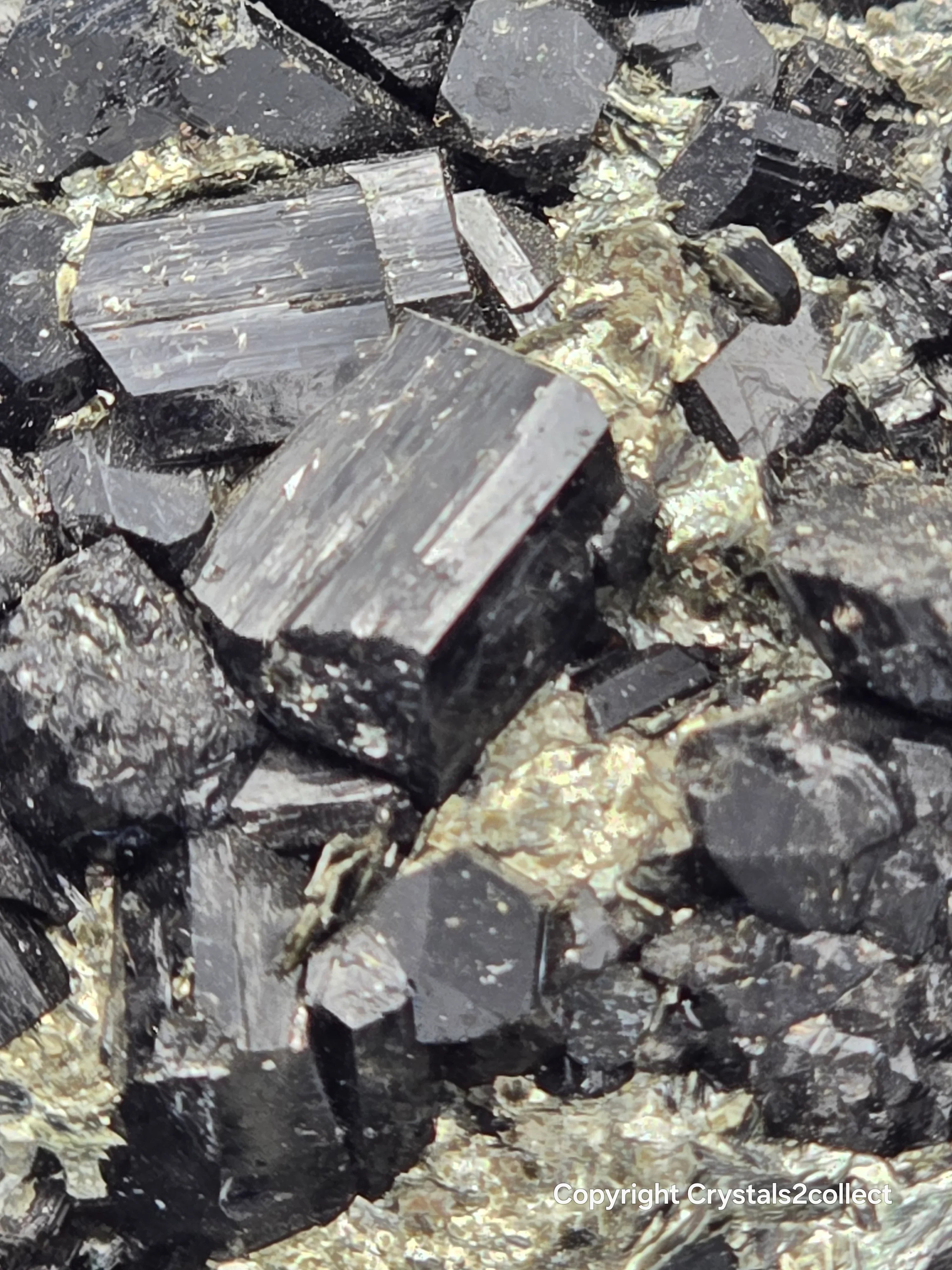 Hematite crystals with metallic luster on matrix, mineral specimen for collectors