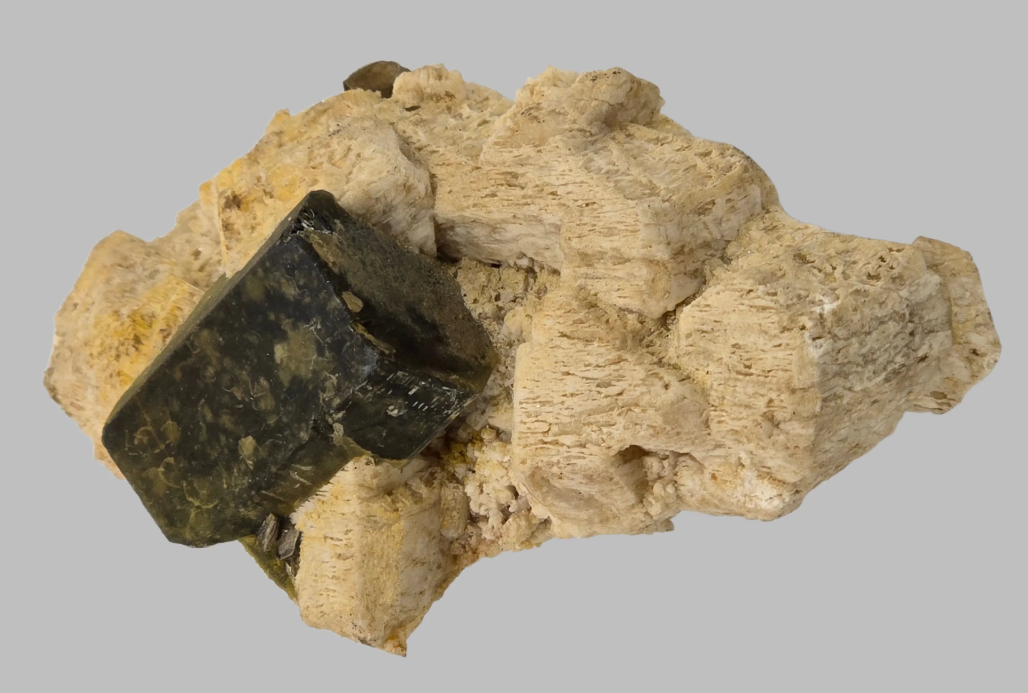 Dark green epidote crystal on light matrix, mineral specimen for collectors