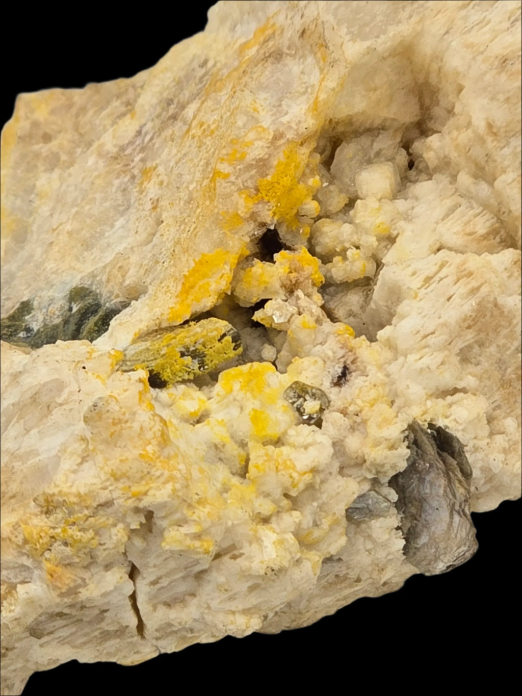 Sulfur crystals on host rock, vibrant yellow mineral specimen for collectors