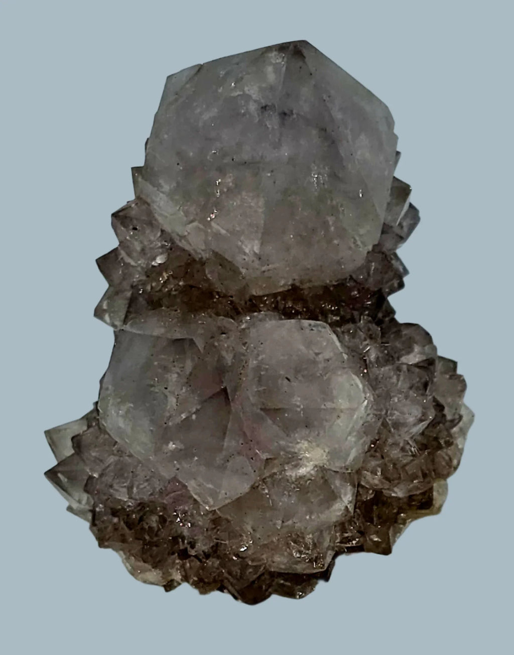 Fluorite crystal cluster with cubic formations, translucent grey-purple hues, natural mineral specimen