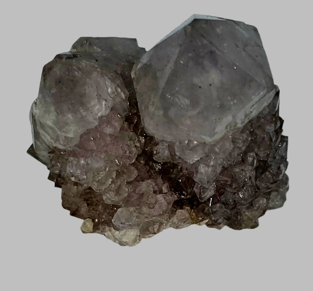 Fluorite crystal specimen with purple and clear cubic formations, mineral collector's display piece