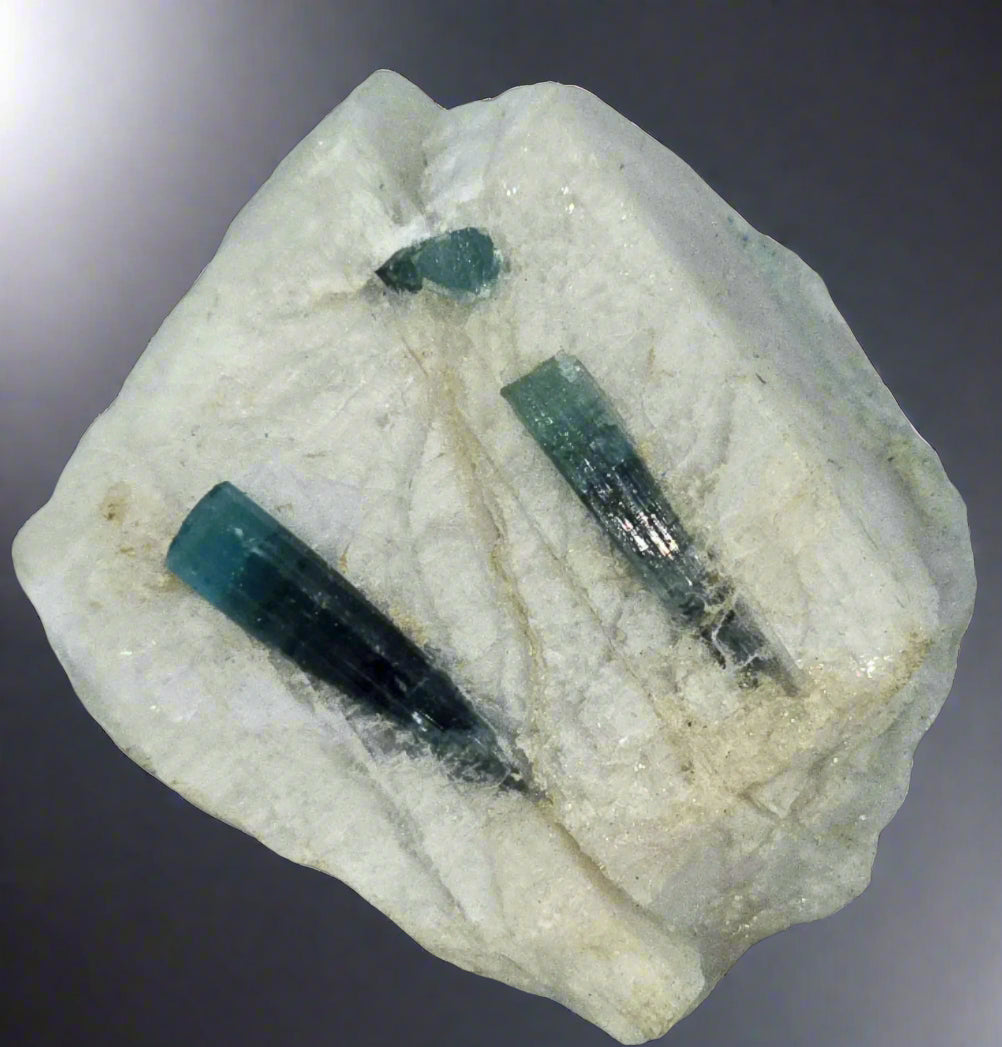 INDICOLITE (BLUE VARIETY OF ELBAITE) in QUARTZ