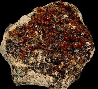 GROSSULAR GARNETS, QUARTZ, HEMATITE