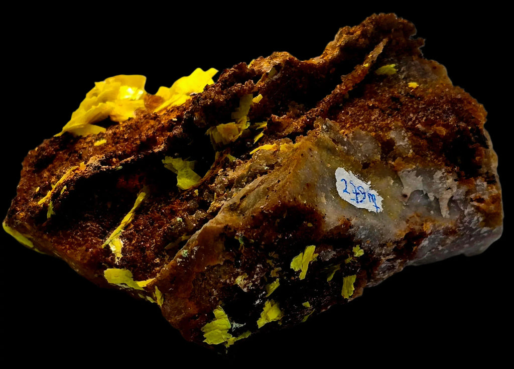 Sulfur crystals on matrix, vibrant yellow flakes on dark host rock, mineral specimen for collectors