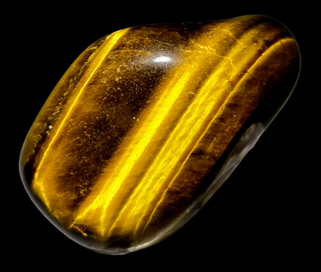 Tiger's Eye polished cabochon with golden-brown bands, smooth gemstone for collectors