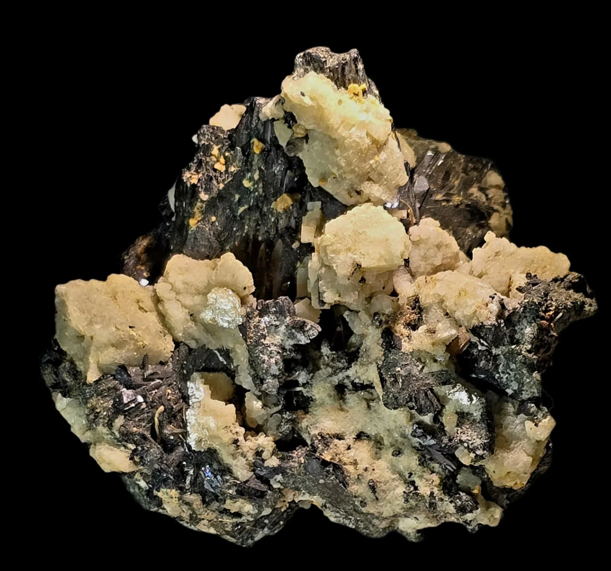 Calcite on Galena mineral specimen from classic locality, showcasing creamy crystals on dark matrix