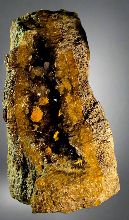 Wulfenite on matrix from Mexico, vibrant orange crystals in geode cavity, mineral specimen for collectors