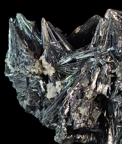 Stibnite mineral specimen with sharp metallic crystals and iridescent sheen, classic locality specimen for collectors