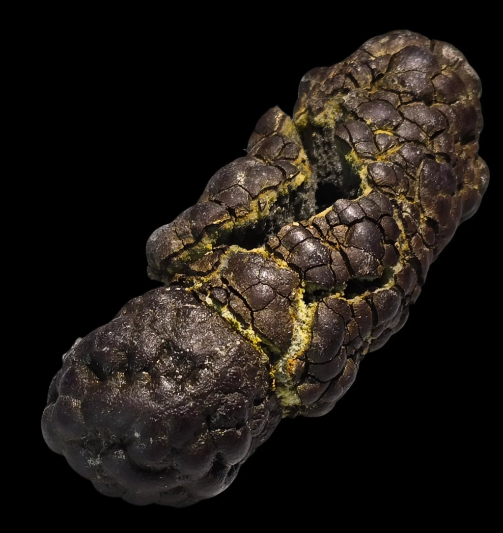 Sphalerite mineral specimen with textured dark surface and yellow veining, classic locality