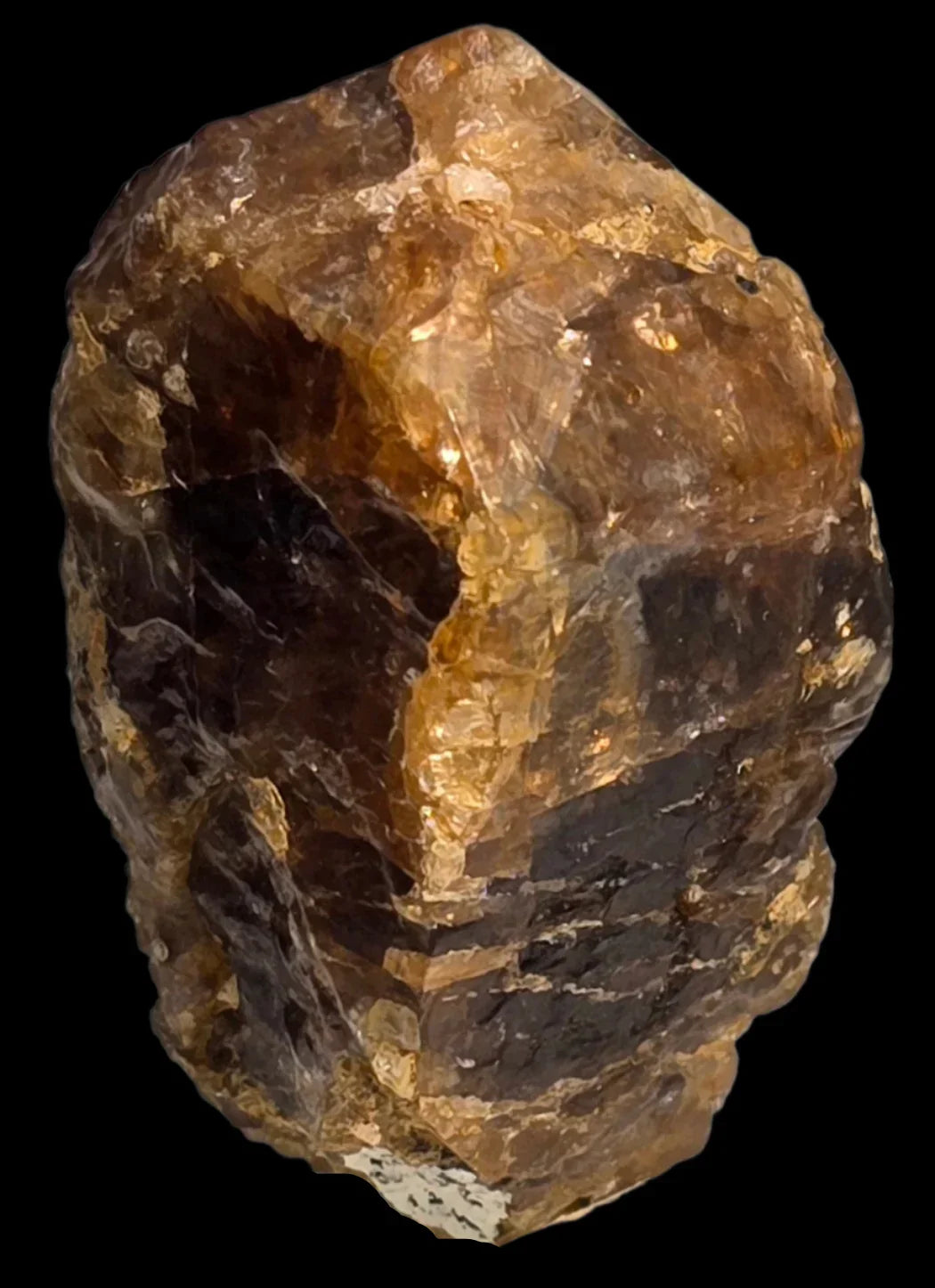 Citrine crystal specimen with golden-brown hues and natural facets, showcasing mineral clarity and earthy texture