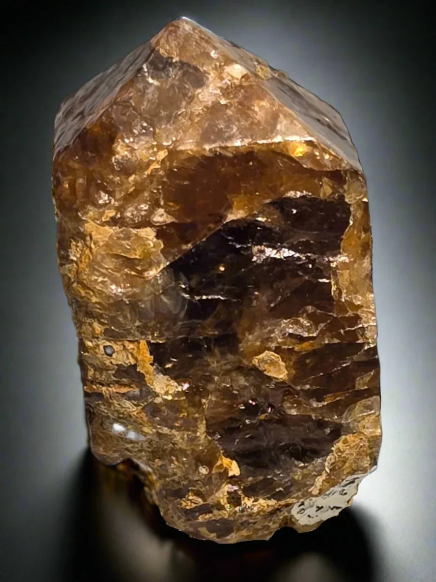 Smoky Quartz crystal specimen from Brazil, showcasing rich brown tones and natural facets for mineral collectors