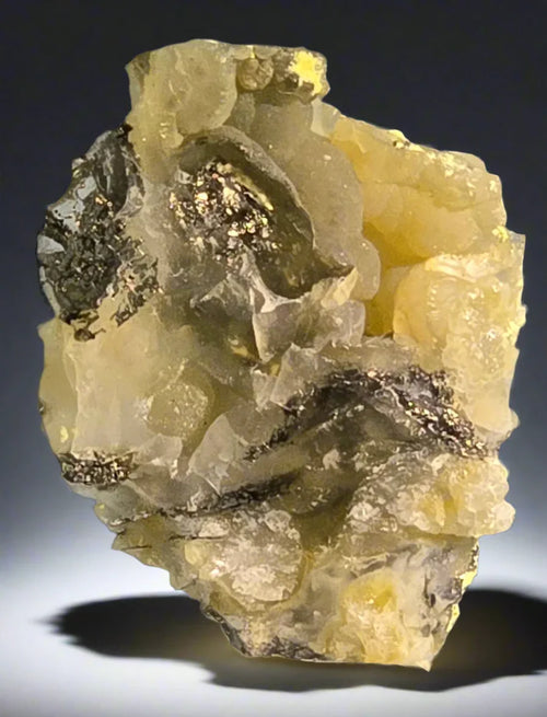 Sphalerite on Calcite from Spain, yellow translucent crystals with metallic inclusions, mineral specimen