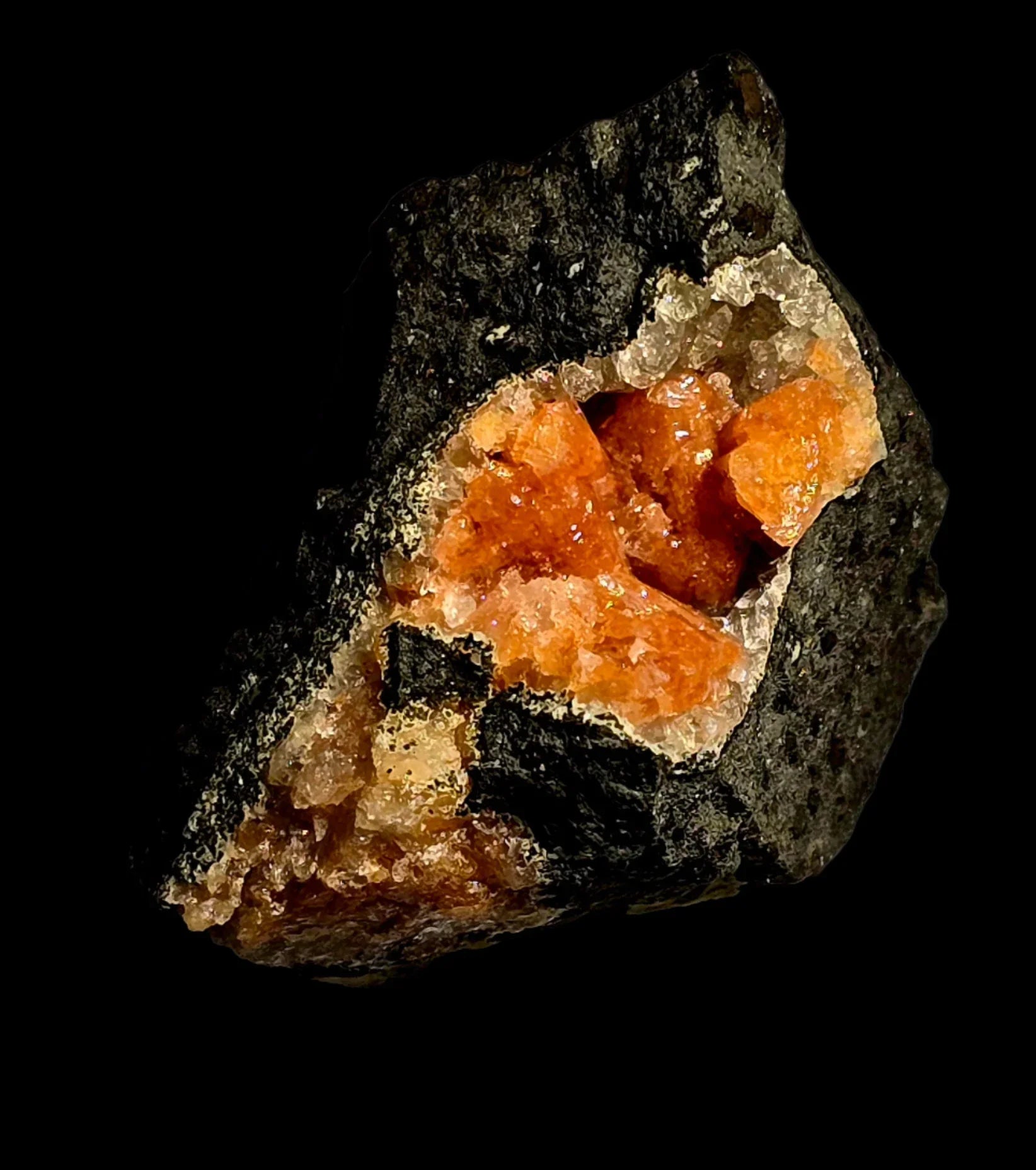 Vibrant orange vanadinite crystals on dark matrix, mineral specimen for collectors