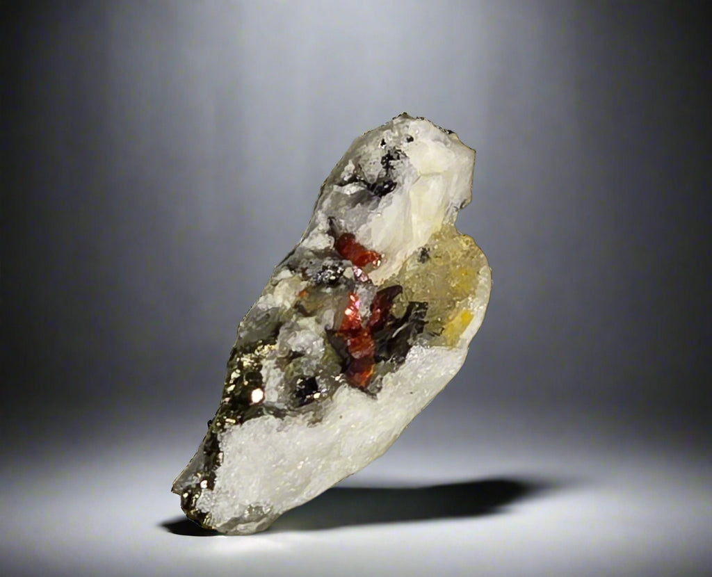 REALGAR (AURIPIGMENT) with JORDANITE, covered partially with most likely BINNITE (Tennantite) from the Lengenbach Quarry (micro and miniature)