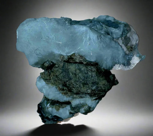 Celestine crystal specimen from Madagascar, showcasing translucent blue blades on matrix