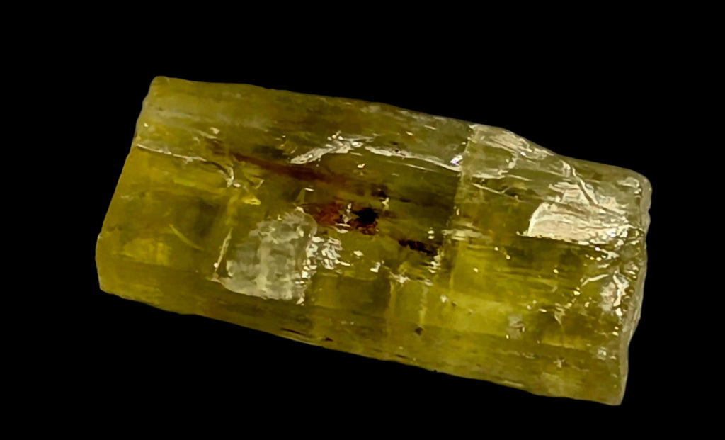 Yellow calcite crystal specimen with natural inclusions, mineral collector's item