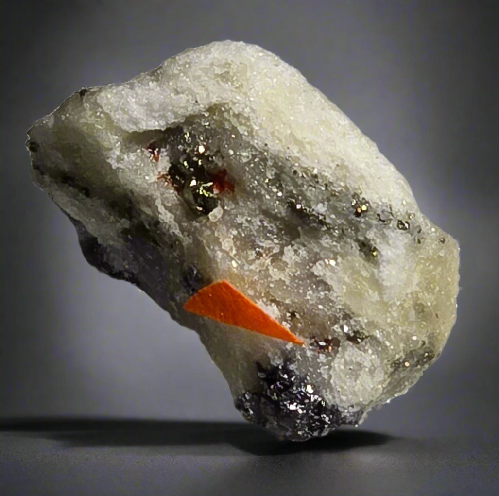 HUTCHINSONITE (brown in the front), REALGAR, SULFO and others (micro and miniature)