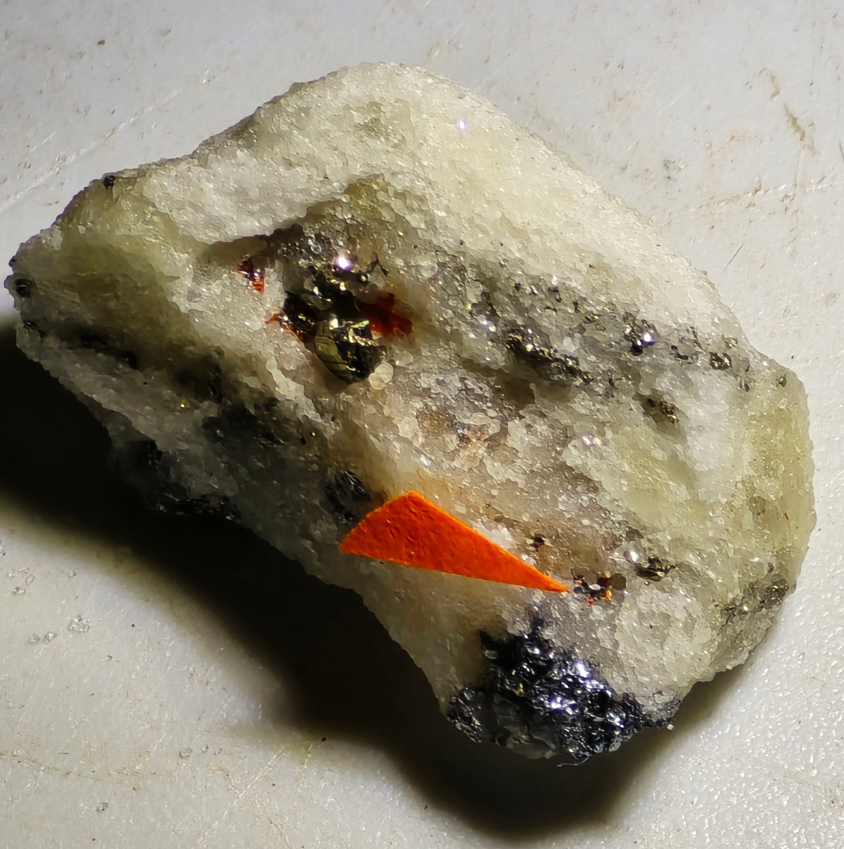 HUTCHINSONITE (brown in the front), REALGAR, SULFO and others (micro and miniature)