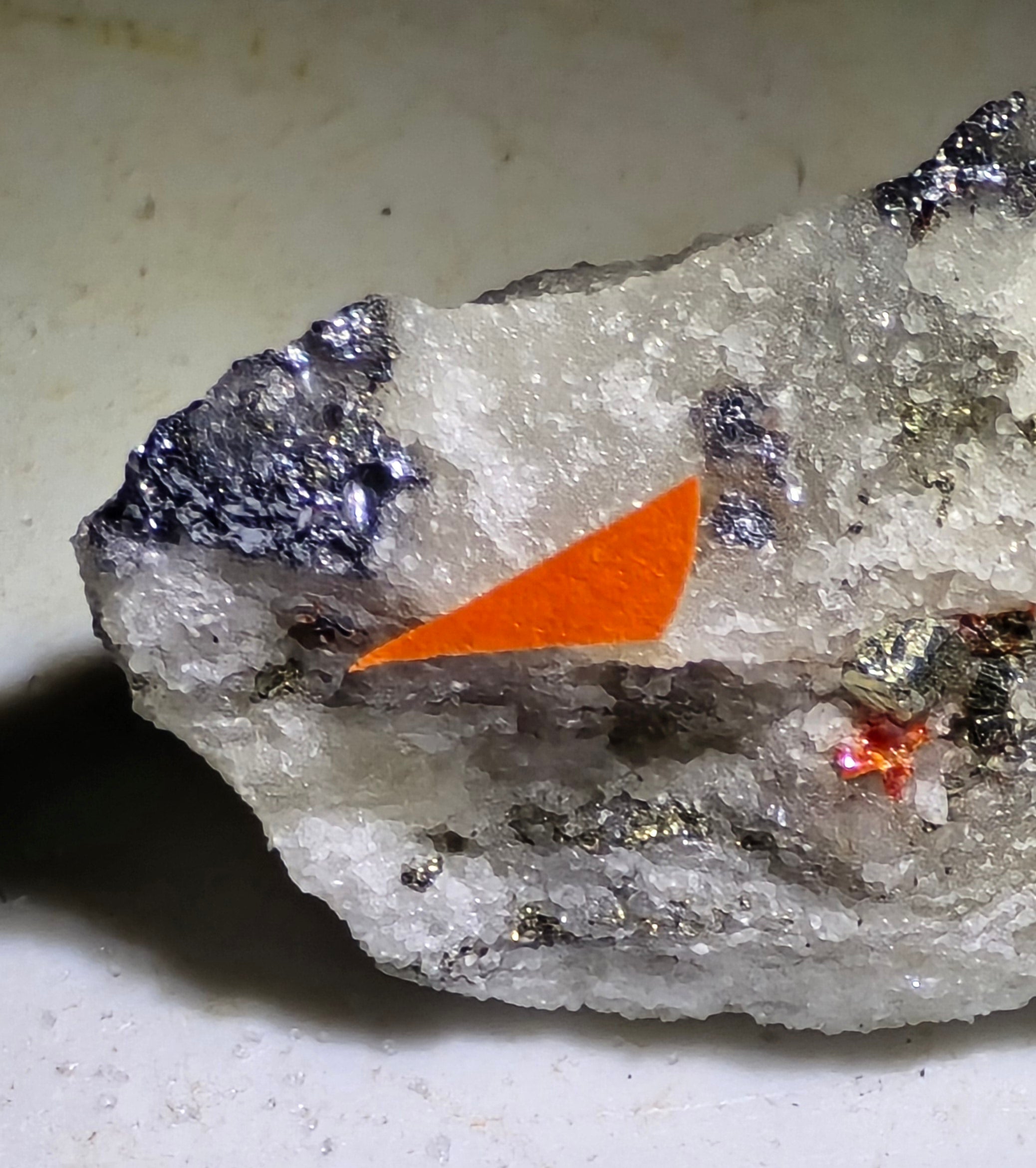 HUTCHINSONITE (brown in the front), REALGAR, SULFO and others (micro and miniature)