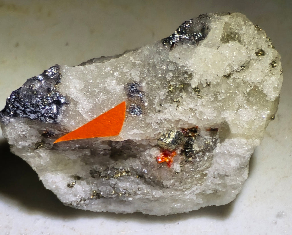 HUTCHINSONITE (brown in the front), REALGAR, SULFO and others (micro and miniature)