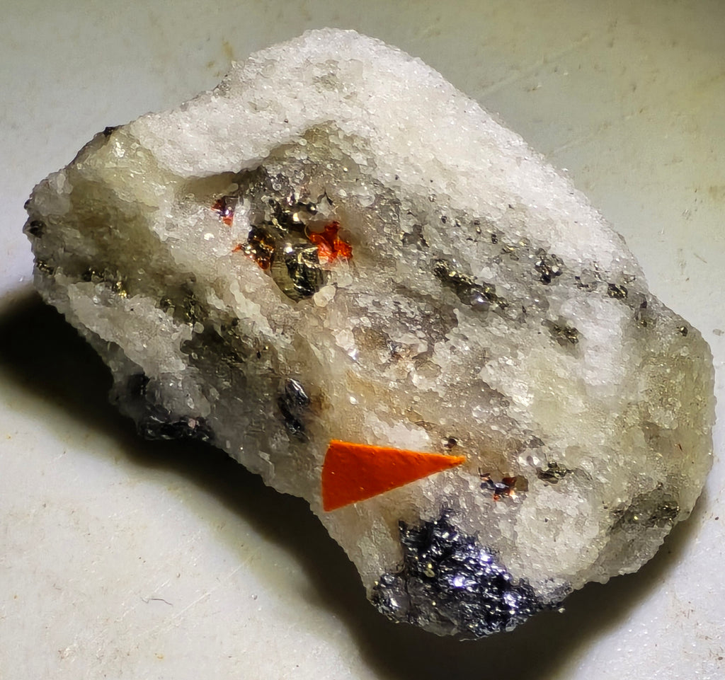 HUTCHINSONITE (brown in the front), REALGAR, SULFO and others (micro and miniature)