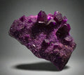 Fluorite crystal specimen with deep purple cubic crystals on matrix, classic mineral collector piece