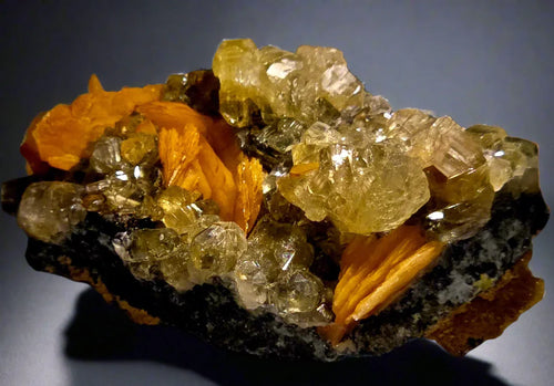 Wulfenite with Calcite from Mexico, vibrant orange crystals on dark matrix, mineral specimen for collectors