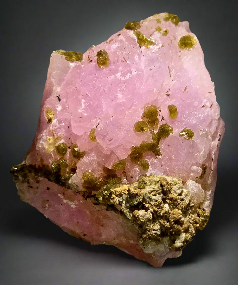 Pink rhodochrosite with green epidote, classic mineral specimen from Argentina