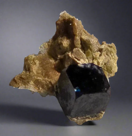 Hematite crystal on matrix from Australia, showcasing deep metallic luster and natural mineral formation