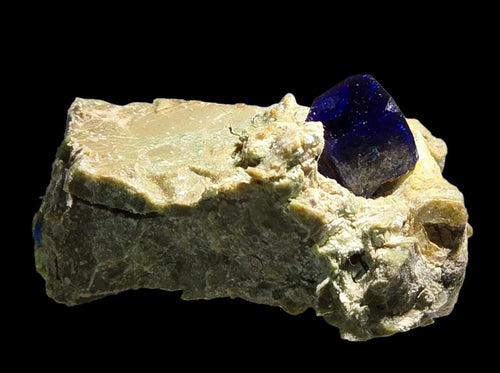 Vivid blue tanzanite crystal on matrix, rare mineral specimen for collectors
