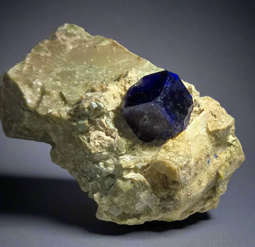Deep blue lapis lazuli crystal on matrix, classic mineral specimen for collectors