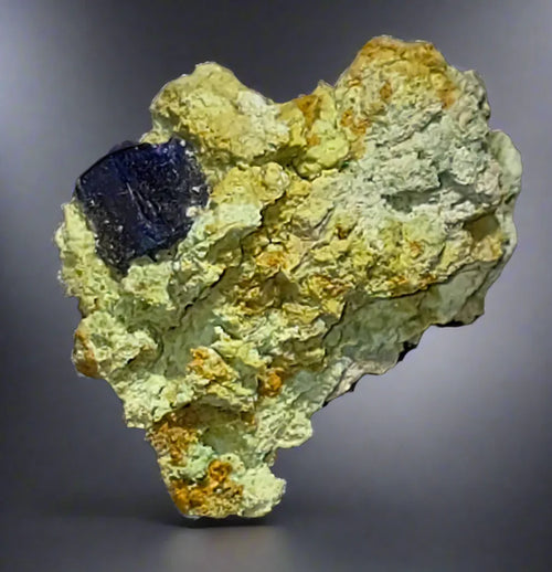 Fluorite on Barite from China, vibrant blue crystal embedded in yellow-green matrix, mineral specimen for collectors