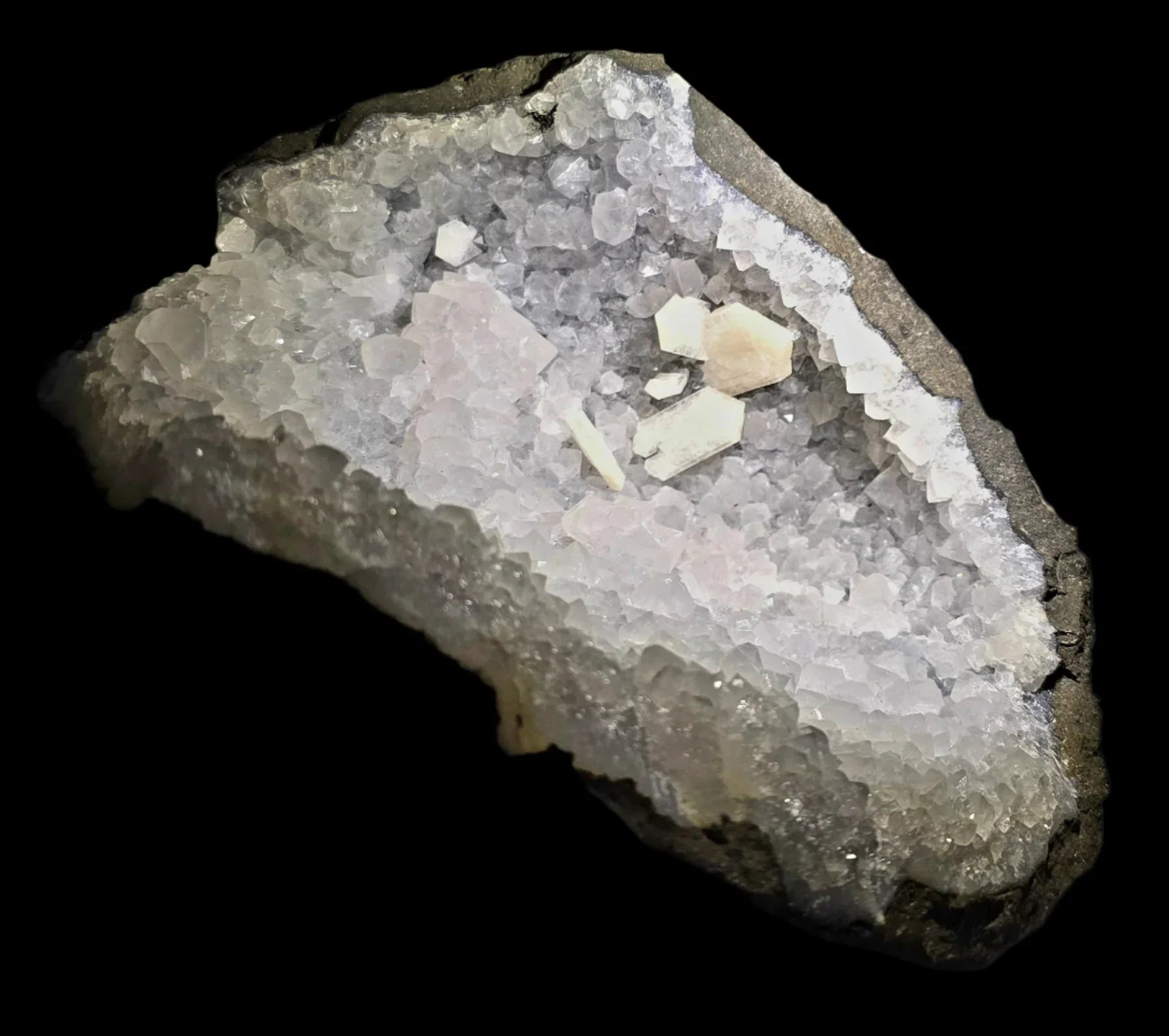 Quartz crystal cluster with pink and white minerals, natural geological specimen