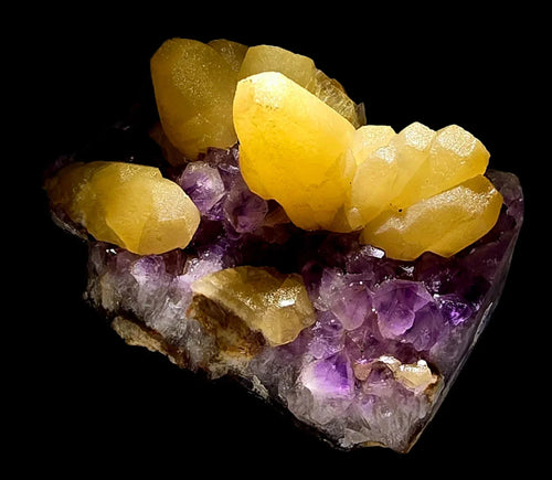 Calcite on Amethyst specimen from classic locality, vibrant yellow crystals over purple matrix