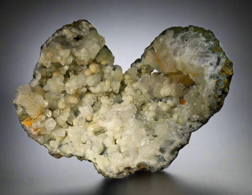 Quartz crystal cluster from classic locality, featuring clear points and earthy matrix