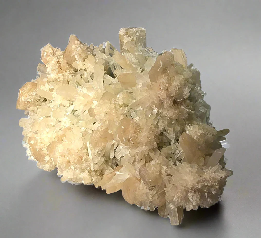Calcite crystal cluster from Elmwood Mine, Tennessee, featuring delicate, translucent formations ideal for mineral collectors.