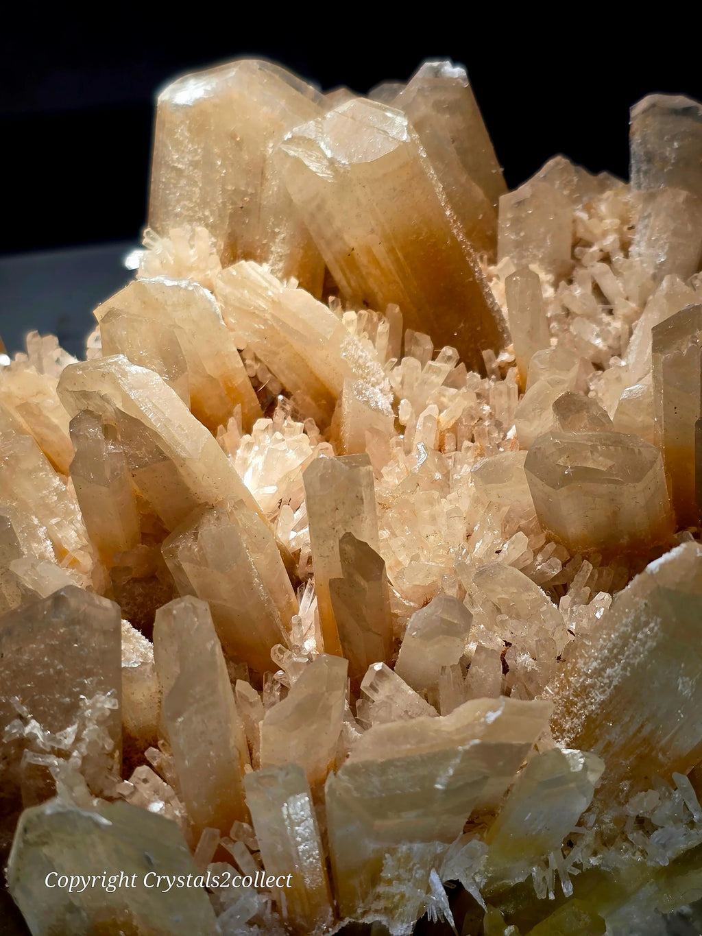 Clear quartz crystal cluster with golden hue, natural mineral specimen for collectors