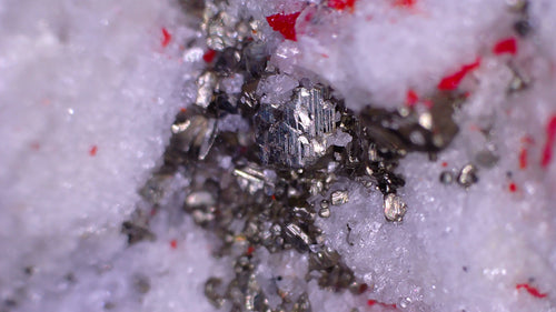 Pyrite crystals on white matrix with red accents, mineral specimen for collectors