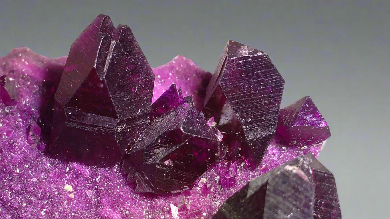 Fluorite crystals from China, deep purple cubic formations on sparkling matrix
